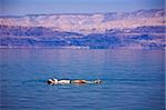 Man floating at the Dead Sea, Israel