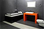 Contemporary black bathroom with orange wash basin