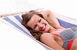 Close-up portrait. Sexy woman wearing bikini relax on hammock. Isolated on the background