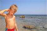 small boy on the beach
