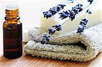 Bar of natural aromatherapy soap with dried lavender and essential oil