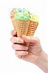 Three delicious ice creams cones isolated on white background