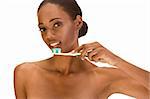 Beautiful young shirtless African-American woman with Slicked Back Hair with toothbrush and blue toothpaste