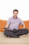 casual man sitting on sofa