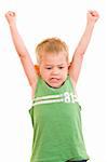 A gorgeous little cute three year old with his arms in the air and a cute facial expression, isolated on white.