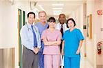 Hospital Team Standing In A Corridor.