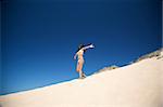 woman with bikini at el palmar beach in cadiz spain