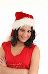 Young teenage girl in red santa's cap