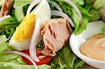 Freshly prepared tuna and egg salad with thousand island dressing.