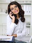 Beautiful business woman is working in office