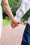 young couple holding hands