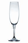 Empty champagne glass on white background