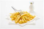 bowl of homemade chips isolation on a white background