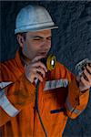 Engineer inspecting the rock mineral stock photo