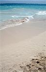 A shot of the beach at the beautiful turquoise Caribbean sea.