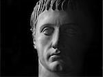 Gypsum head of emperor Germanicus on black background