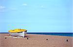 Lonely the boat on seacoast. Spain. Tossa