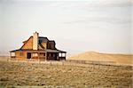 Ranch house newly constructed in late sun, rural midwest United States