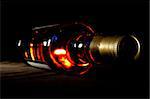 Bottle of whisky on black crisp background