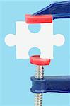 Caliber and puzzle, isolated on blue background