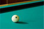 Billiard-ball number twelve on a green table