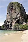 woman walking along beach at krabi thailand