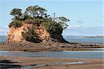 Jagged odd shaped rocks shaped by the water tides over the years