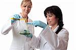 Two happy females conduct clinical, medical  or scientific research using laboratory equipment.