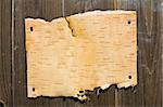 Blank Bark On Wooden Background. Ready For Your Message.