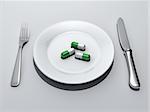 Medicine abuse concept - three pills in a plate - 3d render
