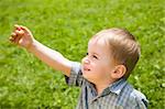 Little Kid Pointing At The Sky