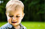 Happy Boy On Nature Background