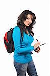 Young student woman with a black backpack  writing on white background