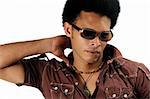 Portrait of young trendy african american man with sunglasses