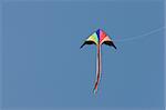 colored kite in blue sky