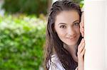 Portrait of young pretty woman in summer environment