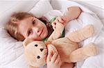 Portrait of cute cute little girl with teddy