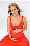 Pregnant girl holding her belly