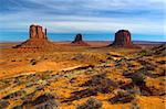 Red rock - semi-desert and the red rock of the Monument Valley with on the background of the famous table mountains