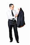 Business man brushing his suit isolated on white background