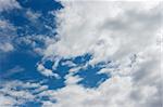 White clouds on deep blue sky