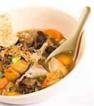 Indonesian oxtail soup on a white background