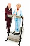Senior man helping his wife program the treadmill.  Full body isolated.