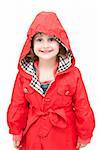 Little girl dressed with a red coat.