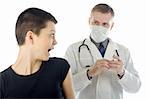 Doctor in gauze mask looks at a frightened woman while preparing a syringe