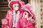 Beautiful carnival couple in pink