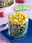 A beef tongue salad with cucumber and maize