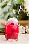 A raspberry float in an outdoor setting