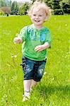 Boy with a flower in a city park