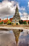 tower reflecting in a pond